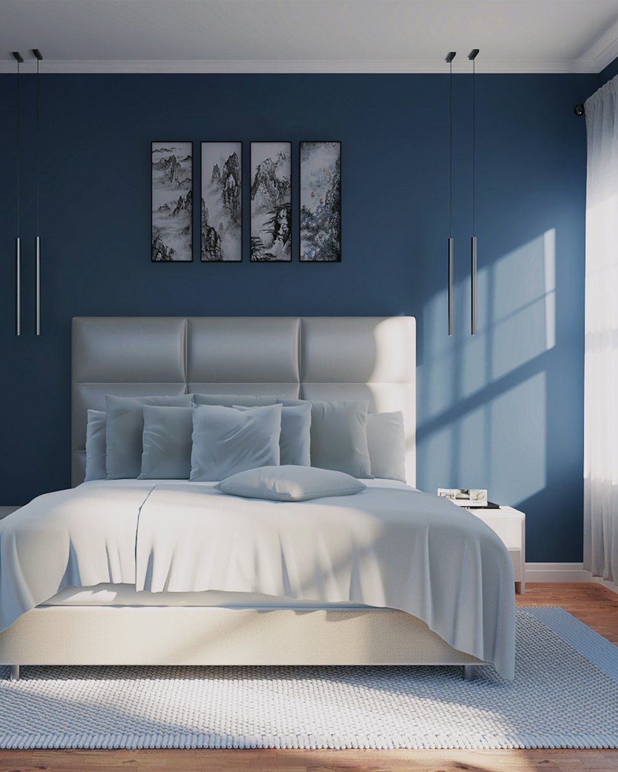 Bedroom with a deep blue wall